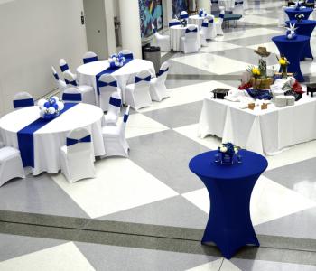 Tables set up at University at Buffalo's Center for the Arts, featuring the "Roadhouse" theme table